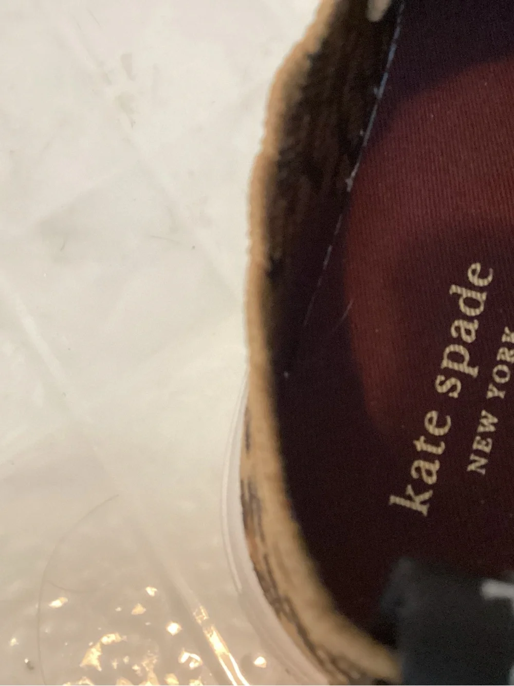 Kate Spade scallop leopard sneakers.